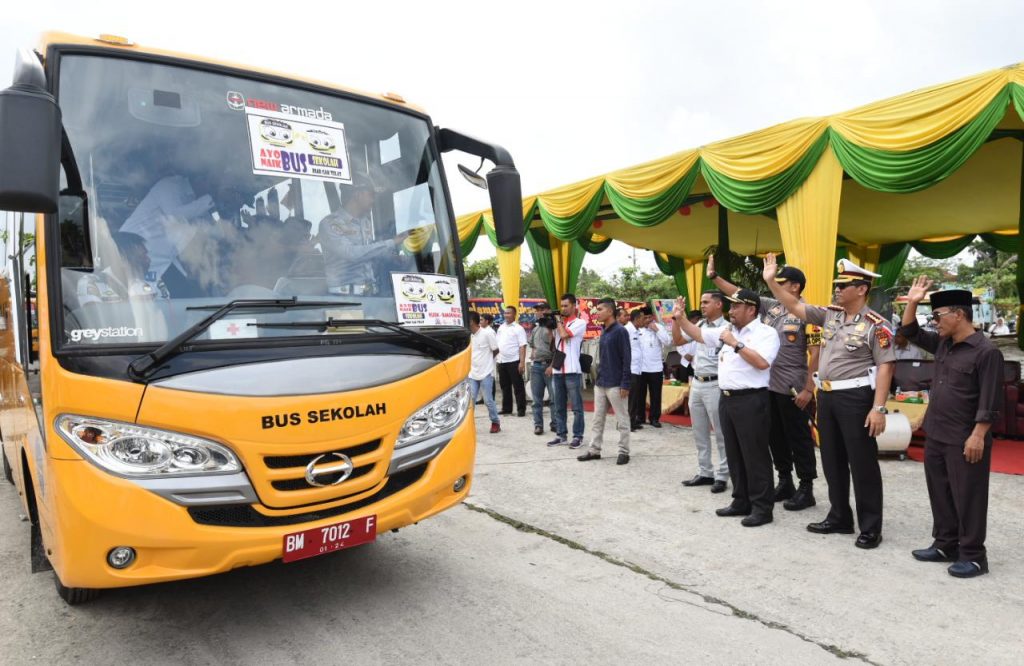 Plt.Bupati Bersama Polda Riau launching 4 Unit Bus Sekolah