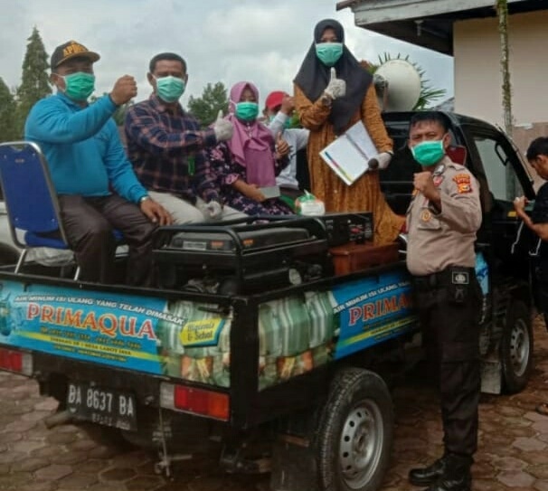 Pemerintah Desa Laboy Jaya ,Beerdayakan Alumni Pelatihan Menjahit Untuk Membuat Masker