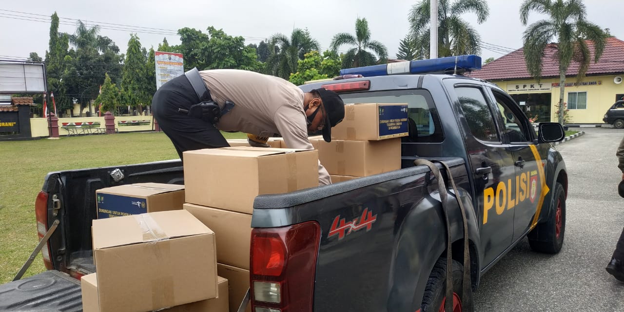 Polres Kampar Distribusikan 455 Paket Sembako dari Kementerian Pariwisata RI Untuk Masyarakat