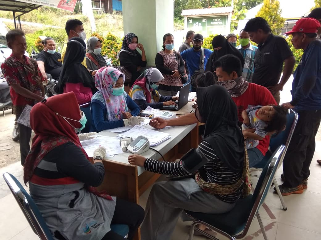 Polsek Kecamatan Langgam Bekerjasama Dengan BLUD Puskesmas Langgam Gelar Vaksinasi Massal