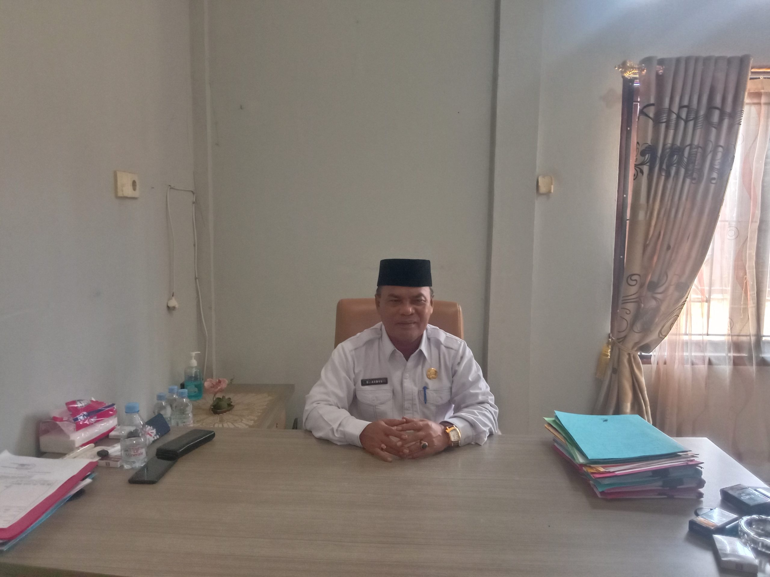 Plt Kadis Disdikpora Kabupaten Kampar  Pelaksanaan Ujian Semester Yang Sedang Berlangsung Sampai Saat Jni Berjalan Dengan Lancar