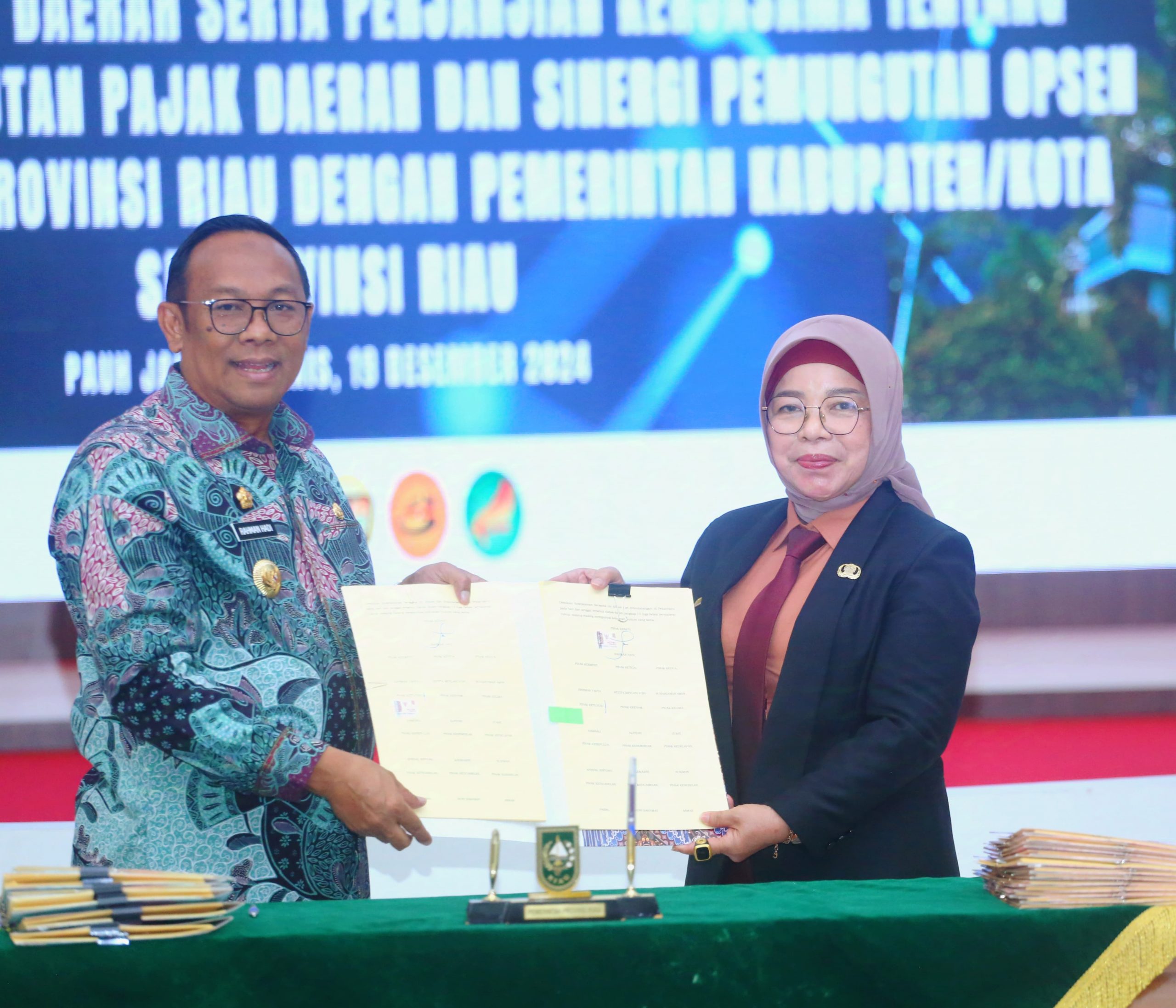 Pj.Sekda Hadiri High Level Meeting Elektronifikasi Sekaligus Mou Optimalisasi Pemungutan Pajak Daerah